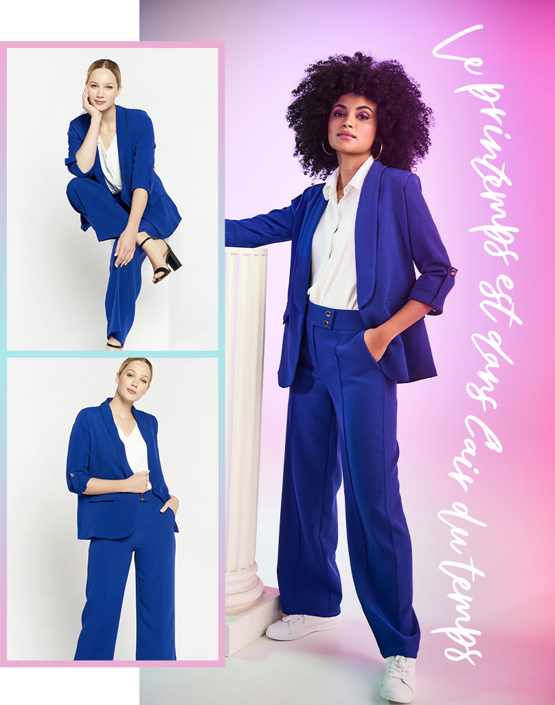 matching suit with blue blazer and blue pants styled with a white blouse and white sneakers.