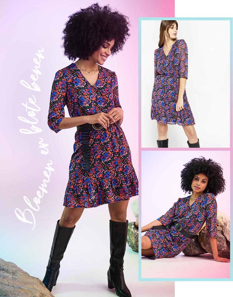 Floral mini dress with long sleeves and V-neck styled with black high knee boots and black belt.