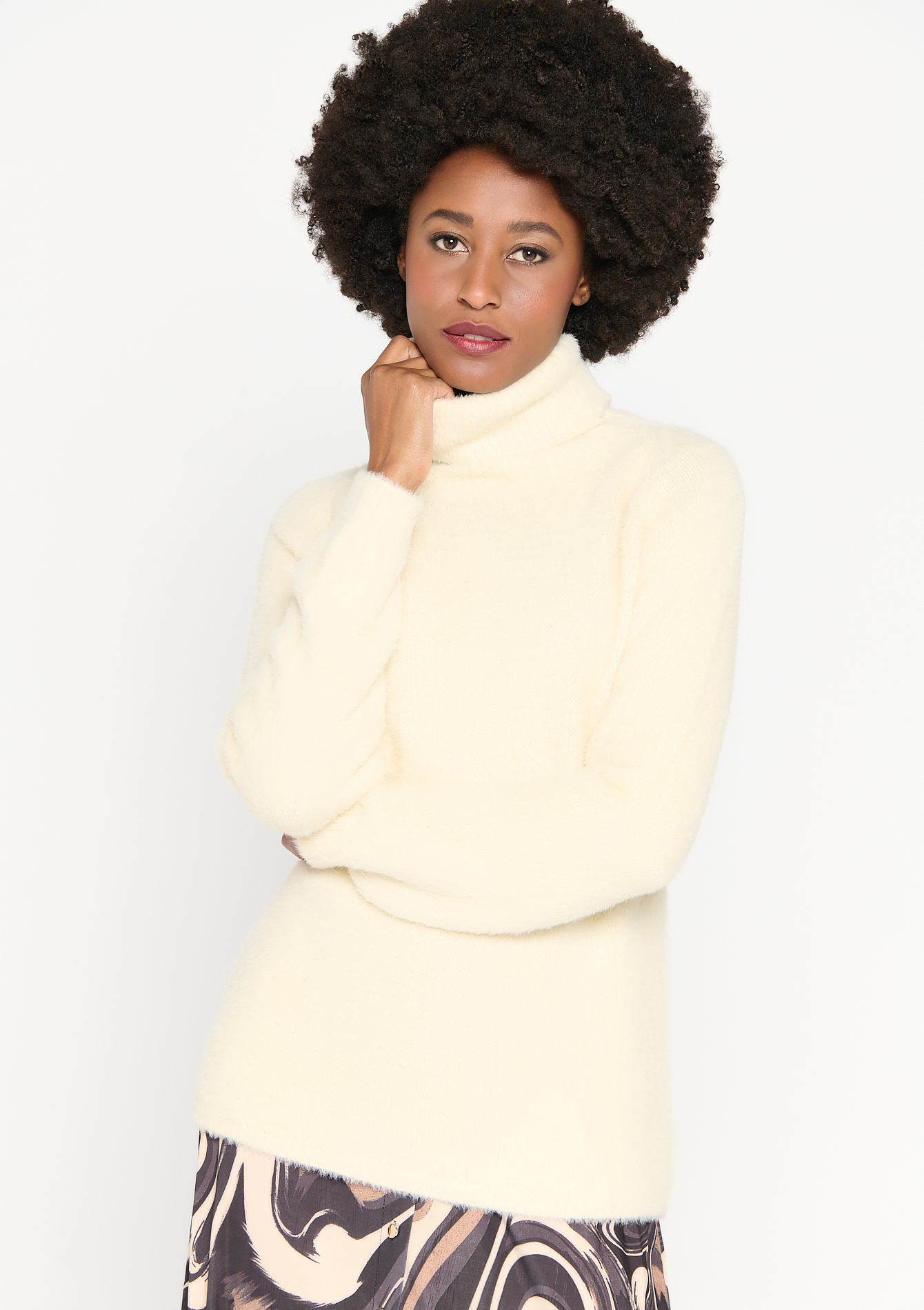 Pull a col roulé en maille poilue