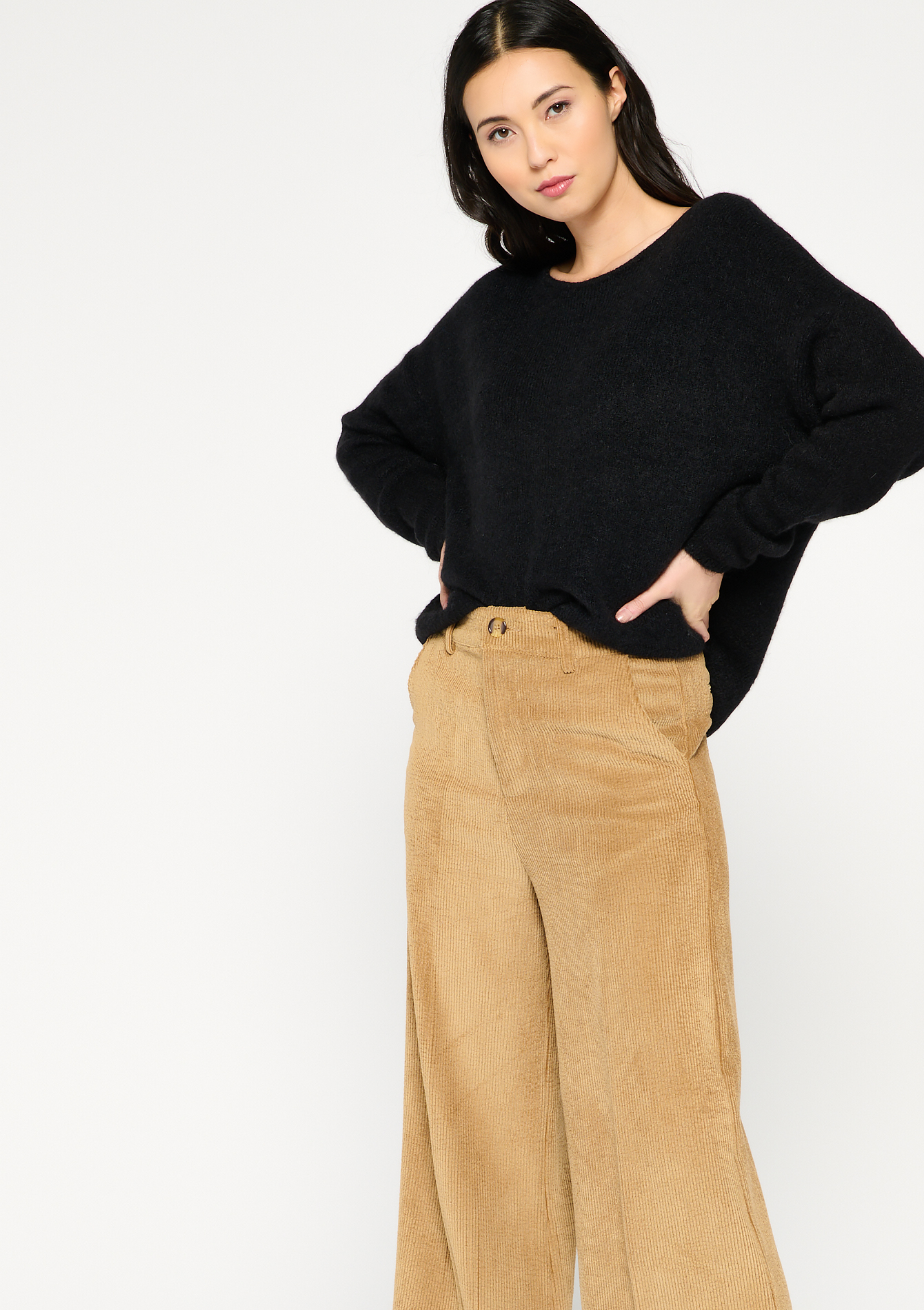 Pull avec boutons dans le dos